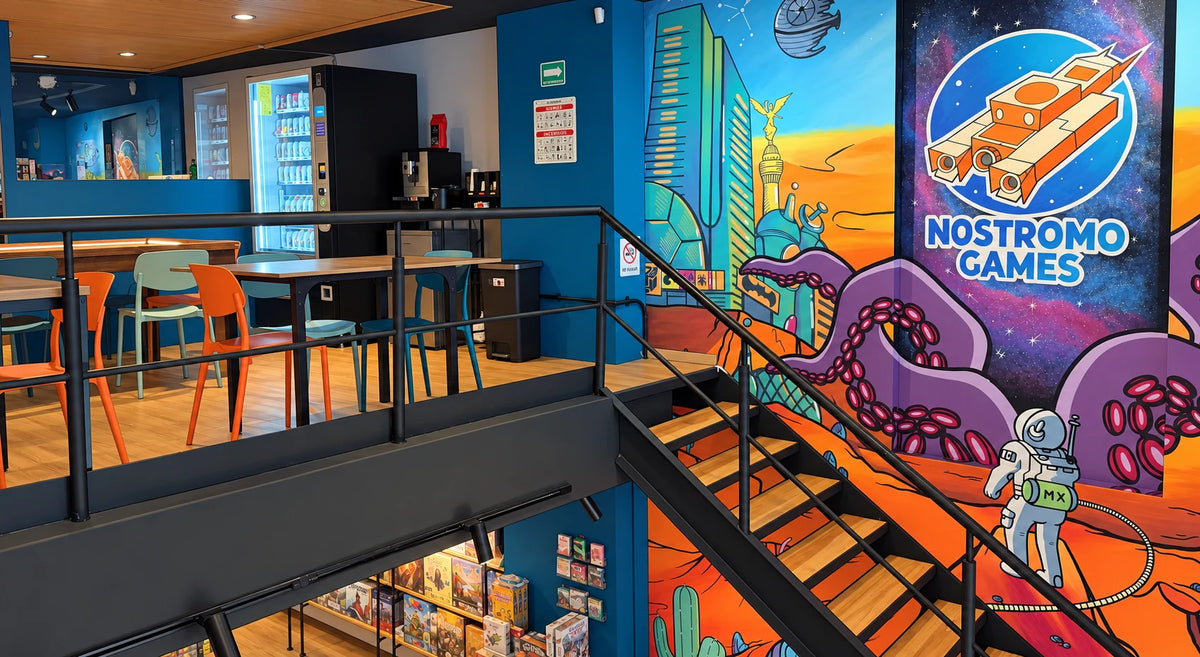 Mesas, escalera y mural de Nostromo Games, con luz equilibrada y toque cómic suave.
